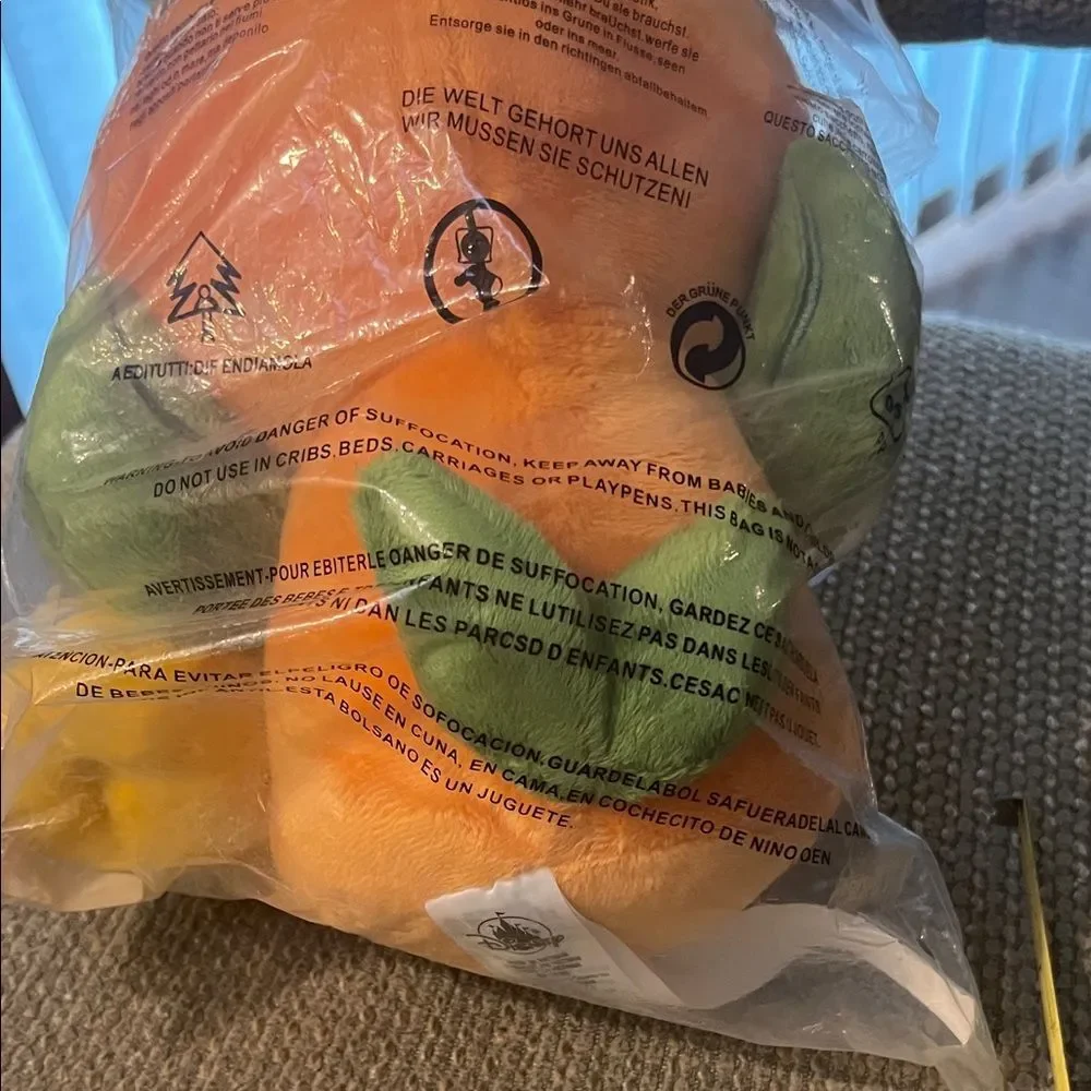 #1099**Orange and Green Plush Toy for Small Pets